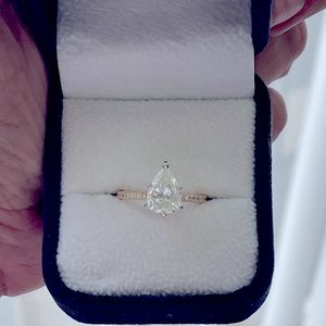 2.02(center stone)pear shape engagement ring sold with wedding band or without.